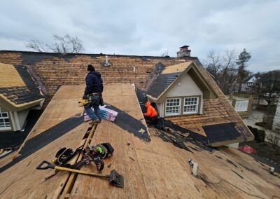 Roofing workers on roof
